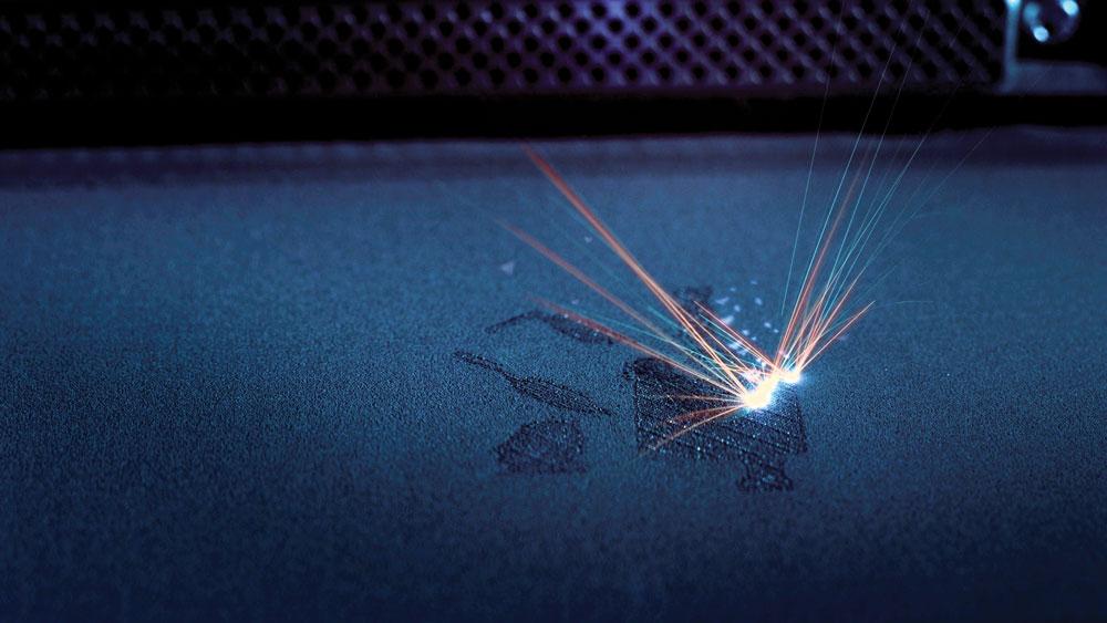 Combined Two-Photon Polymerization and Laser Additive Manufacturing for Nanofabrication